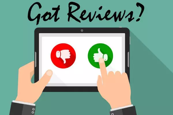 hands on a tablet choosing between thumbs up or thumbs down.  Caption says &quot;Got Reviews&quot;